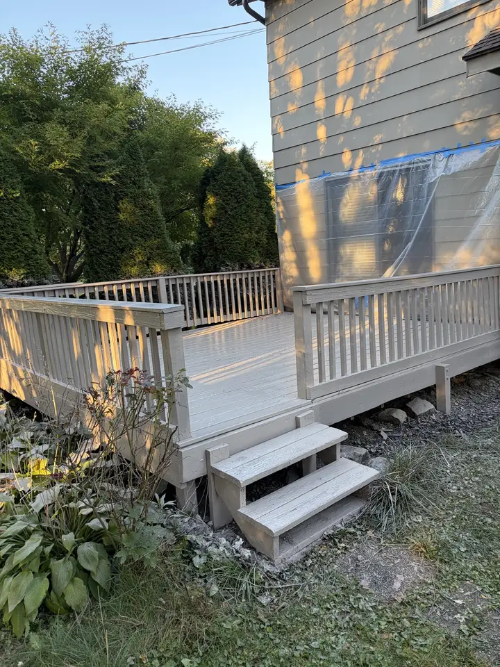 Painted deck with railings and steps