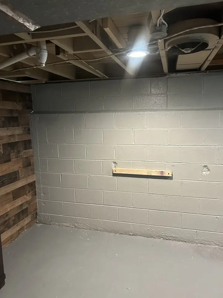 Basement block wall evenly painted